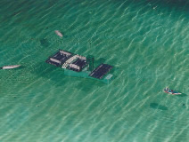 Towing of submerged tube