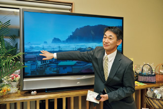 写真：津波の恐ろしさを伝える松本勇毅社長
