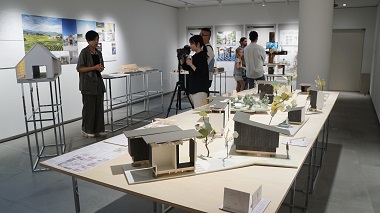 Image: A finalist speaking about their works