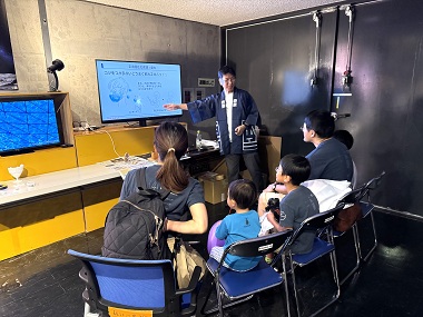 Image: An employee explaining