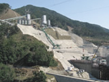High-speed construction of large dams using Special Pipe Transportation Method (SP-TOM)