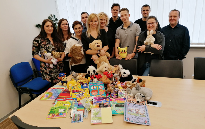 Donating toys and story books to children undergoing radiation therapy