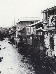 大正10（1921）年頃渋谷駅付近の渋谷川 （写真提供：白根記念渋谷区郷土博物館・文学館）