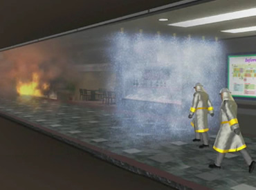 図版：防火シャッターなどは作動時に反対方向の様子が見えませんが、ウォータースクリーンは火元や煙の状態を目視できるため、避難時の安心感とともに、救援・消火活動を容易にします。